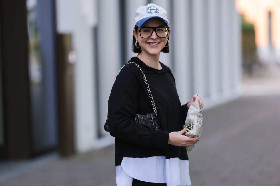 woman eating a bag of potatoes